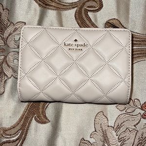 Brand new Kate spade Natalia medium bifold wallet.